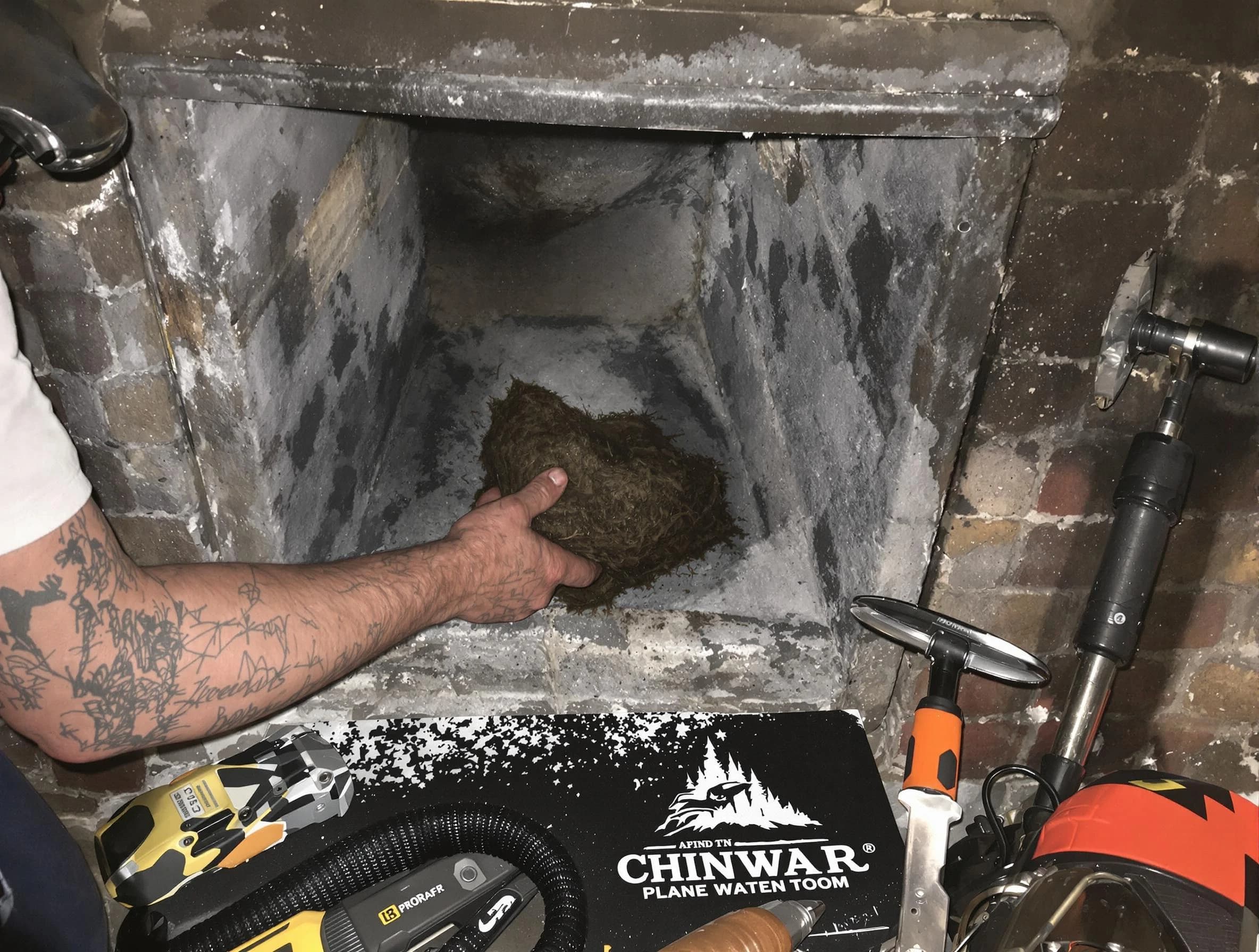 Montgomery Chimney Sweep safely removing debris and screening chimney in Montgomery, NJ